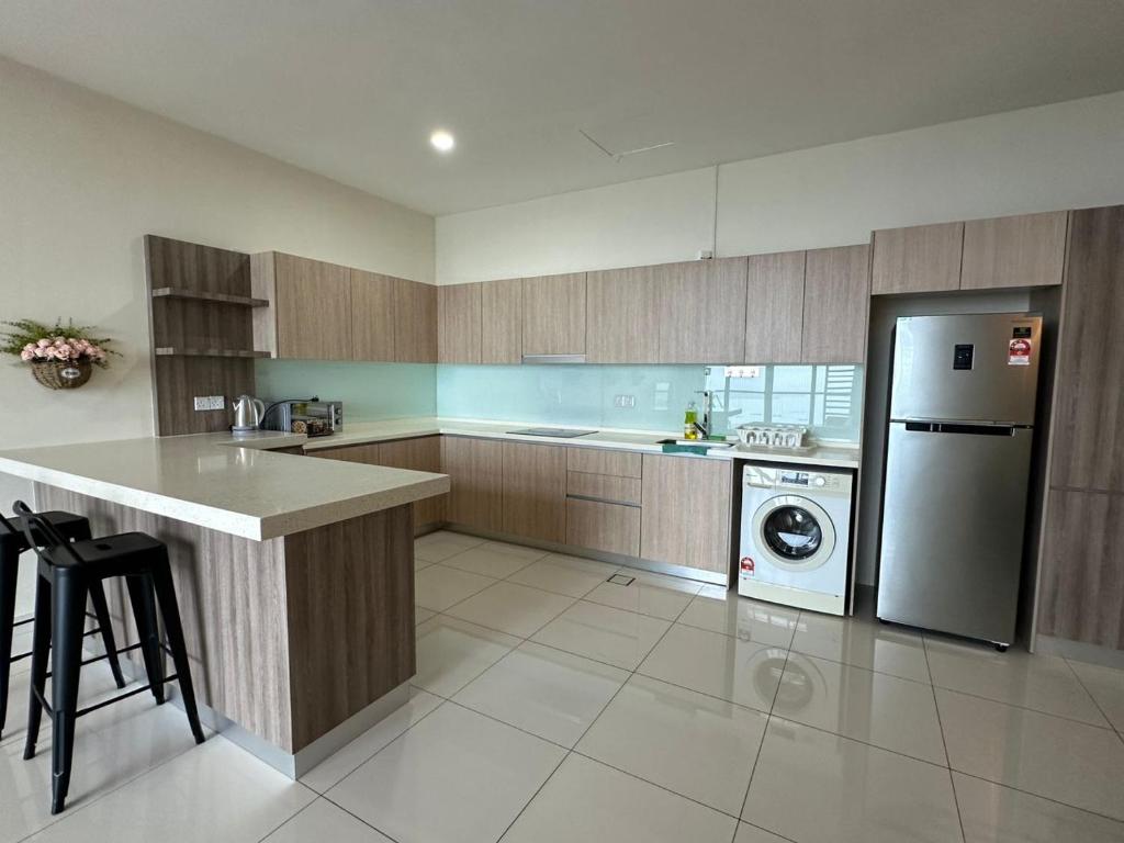 Kuchyň nebo kuchyňský kout v ubytování Cozy couple apartment suite