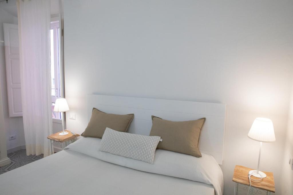 Postel nebo postele na pokoji v ubytování Guest house Le due lagune
