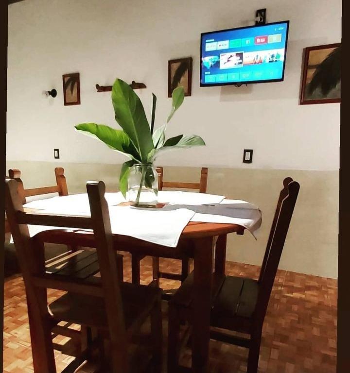 TV a/nebo společenská místnost v ubytování Esquina Apart Hotel