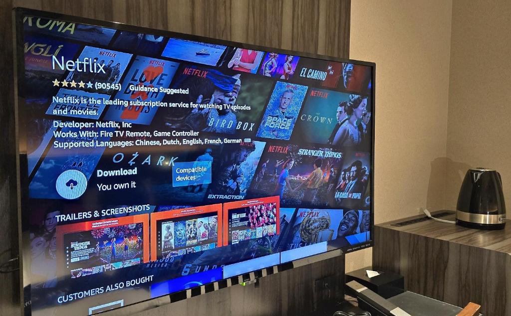 TV a/nebo společenská místnost v ubytování Dynasty Hotel & Resort Osaka