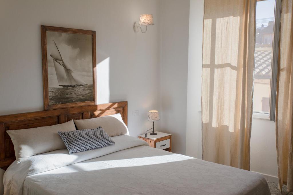 Postel nebo postele na pokoji v ubytování Guest house Le due lagune