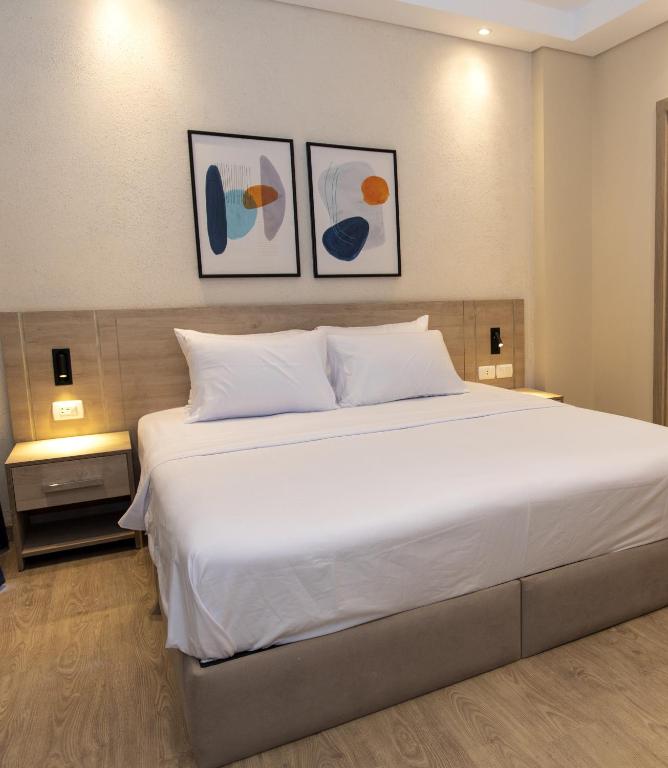 Postel nebo postele na pokoji v ubytování Second Home Hospitality, Rehab City, New Cairo, Cairo Egypt