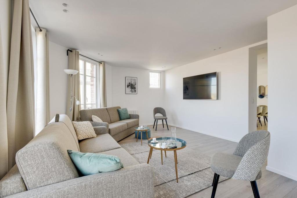 Svetainės erdvė apgyvendinimo įstaigoje 157 Suite Sacha - Superb duplex in Paris