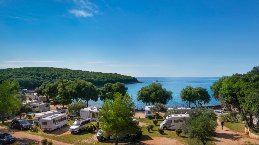 an aerial view of a campground with a lake at Maistra Camping Porto Sole Pitches in Vrsar