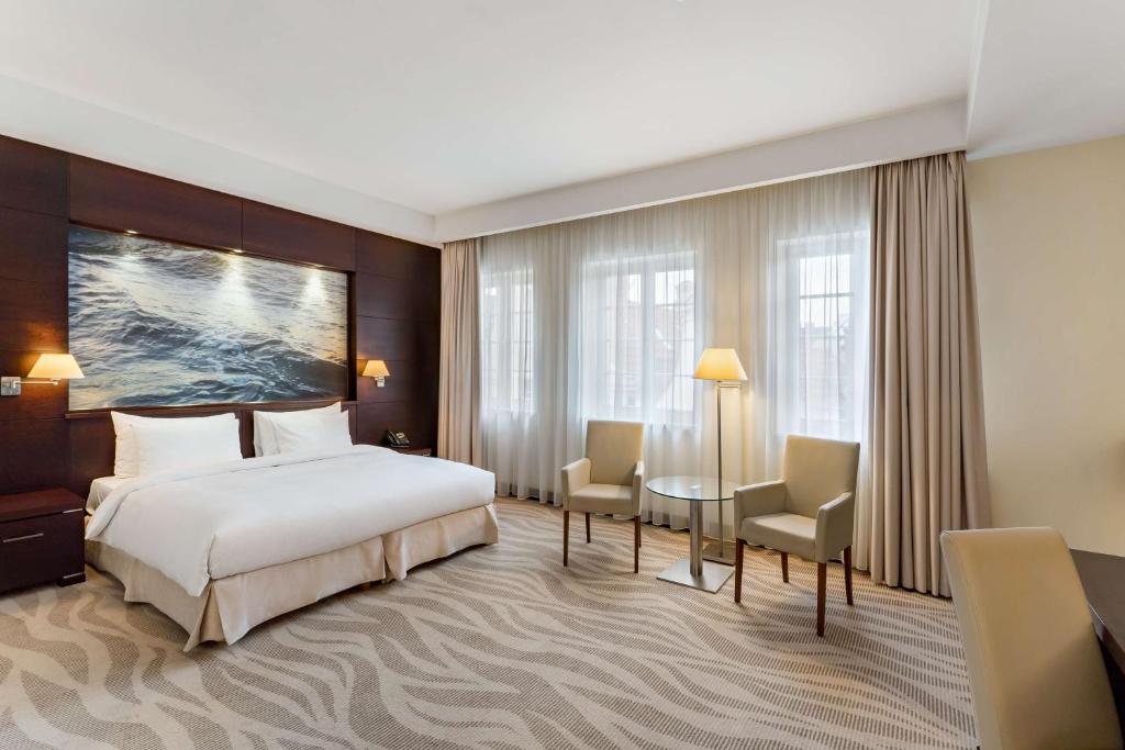 Postel nebo postele na pokoji v ubytování Radisson Blu Hotel, Gdańsk