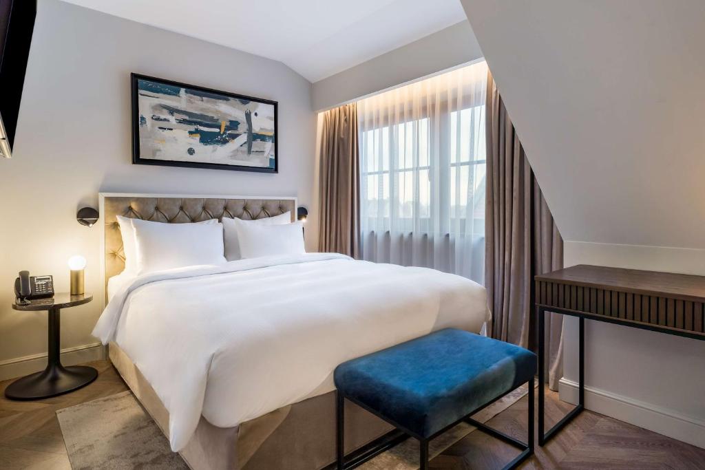 Postel nebo postele na pokoji v ubytování Radisson Blu Hotel, Gdańsk