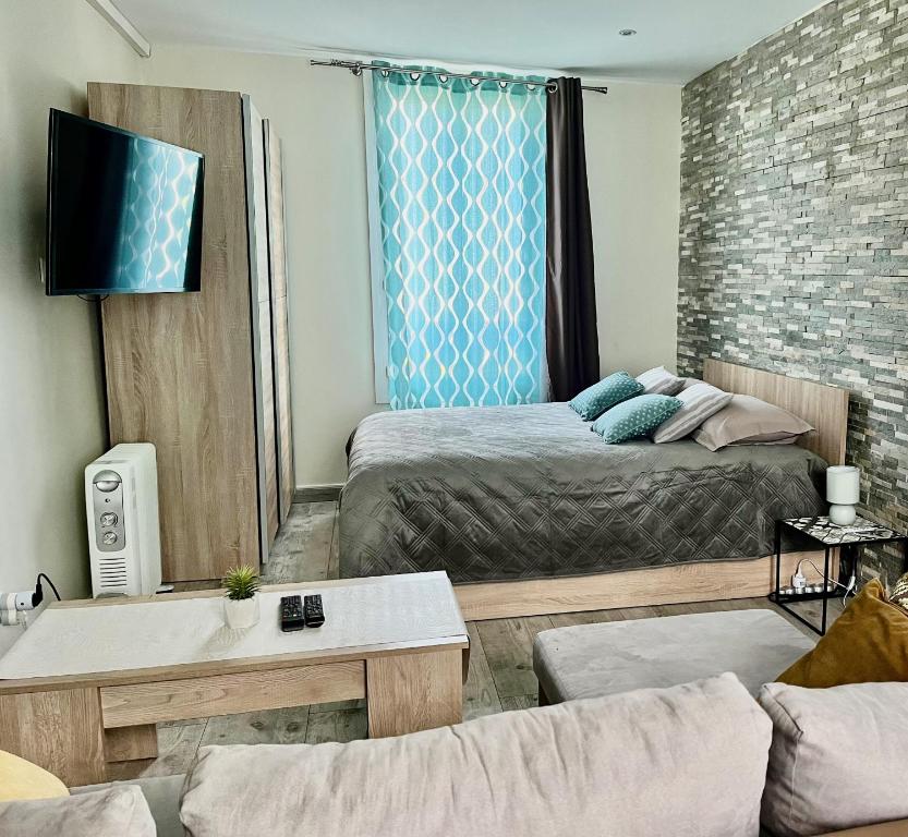 Posteľ alebo postele v izbe v ubytovaní La Villa l'Oiseau Bleu proche de la plage et de Deauville !!! Awards 2024