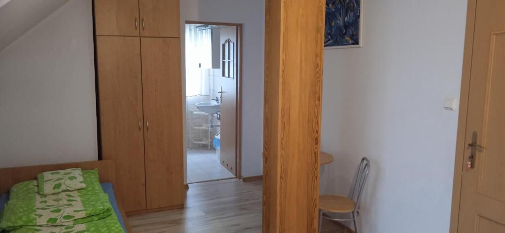 Postel nebo postele na pokoji v ubytování Kaszubskie Nuty