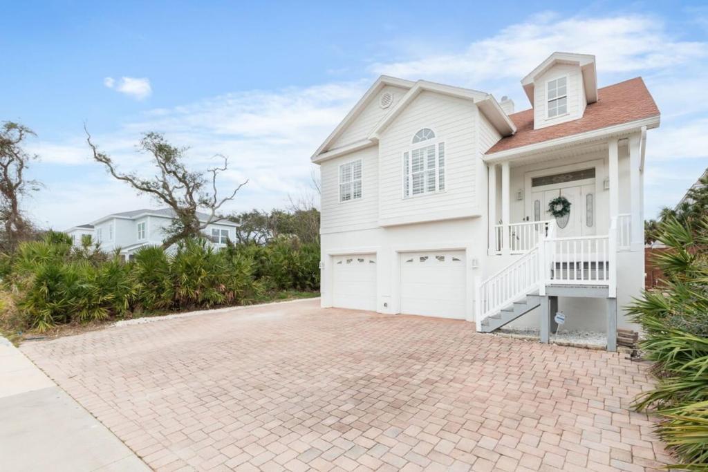 a white house with a driveway at 4BR house, 2 blocks from the beach in St. Augustine