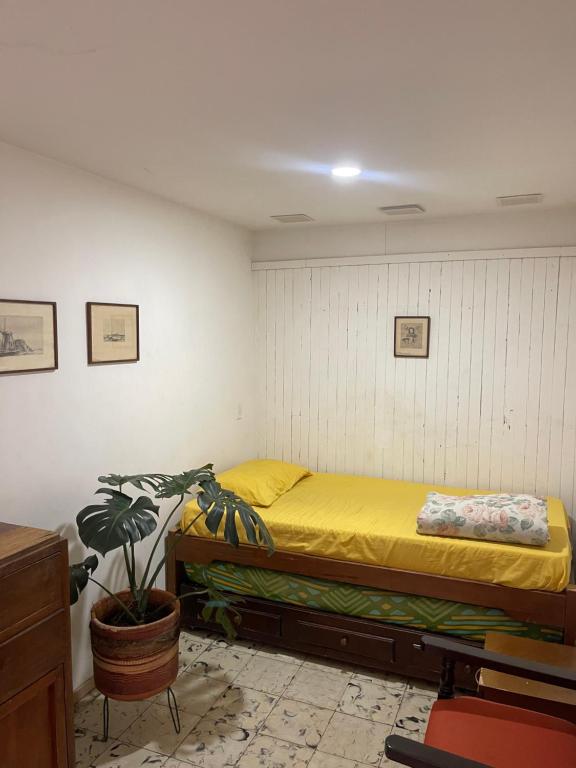 Postel nebo postele na pokoji v ubytování Hostal Casa Las Tías