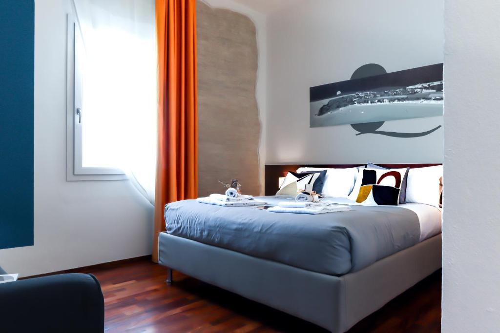 Łóżko lub łóżka w pokoju w obiekcie B&B Qaral