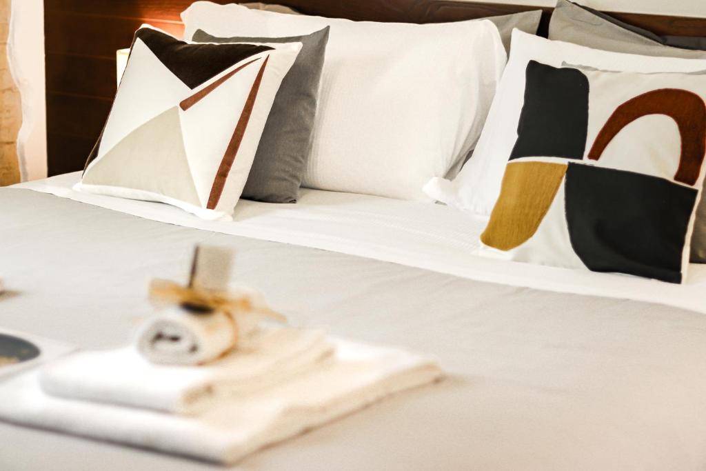 Łóżko lub łóżka w pokoju w obiekcie B&B Qaral
