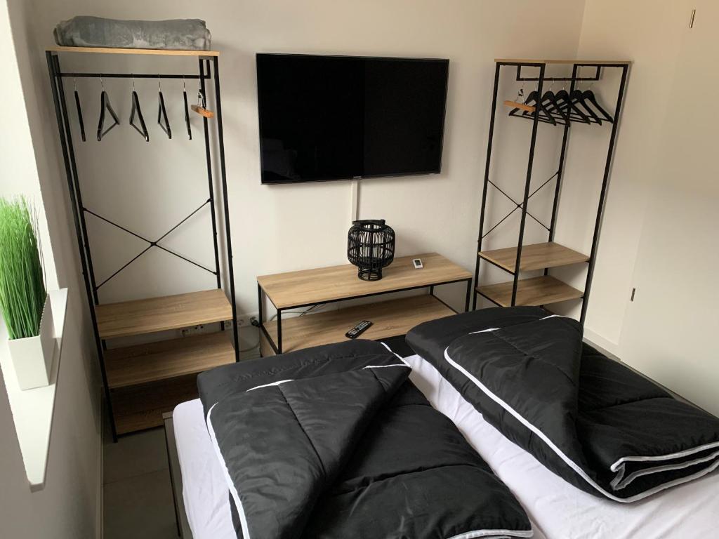 Postel nebo postele na pokoji v ubytování APPARTEMENT3