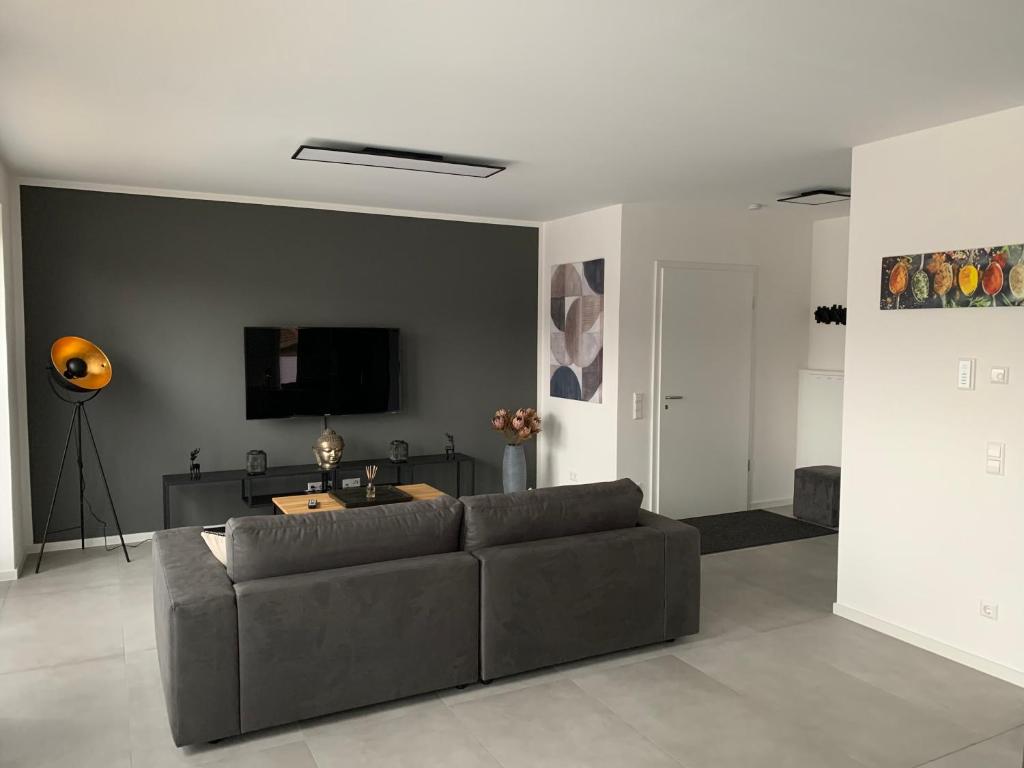 TV a/nebo společenská místnost v ubytování APPARTEMENT3