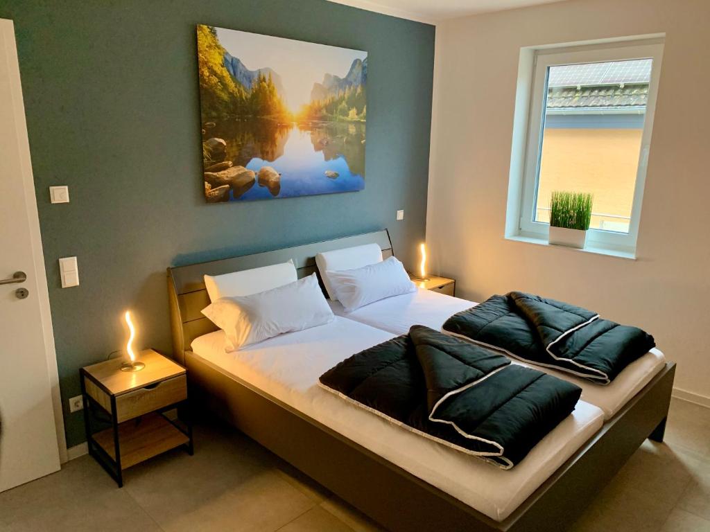 Postel nebo postele na pokoji v ubytování APPARTEMENT3