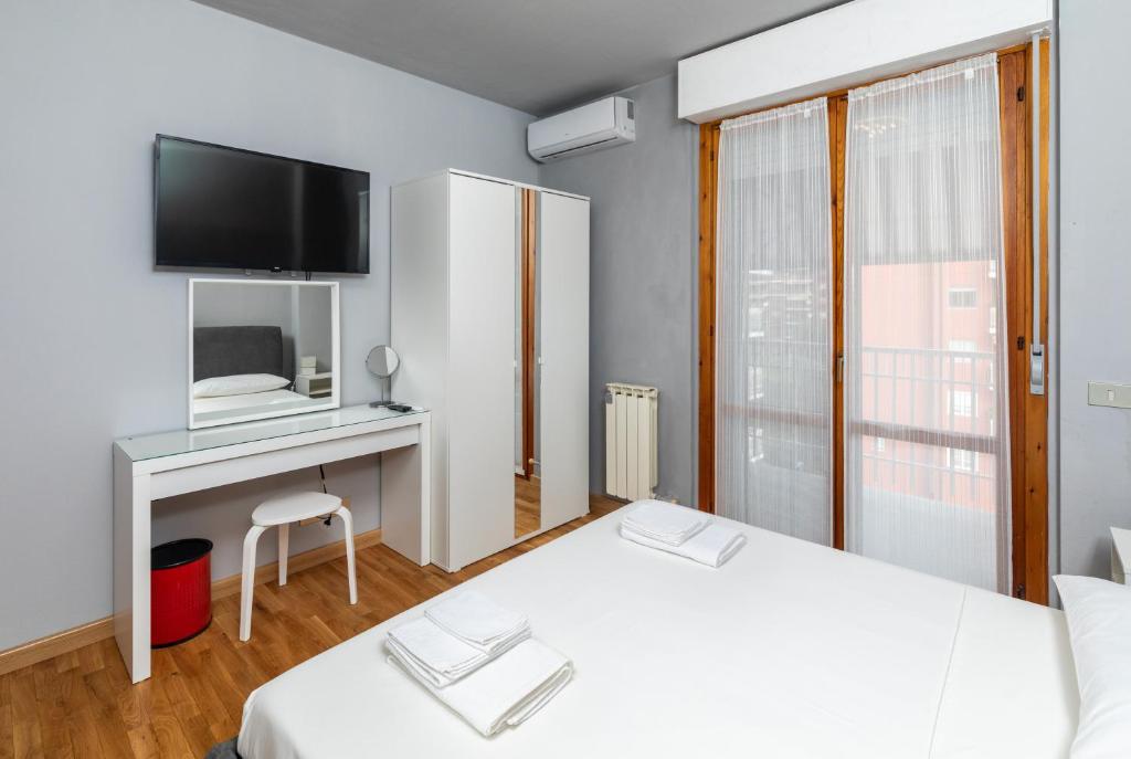 Кровать или кровати в номере Apartment Forum V