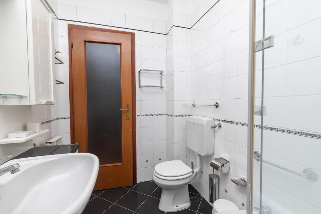 Koupelna v ubytování Apartment Forum V