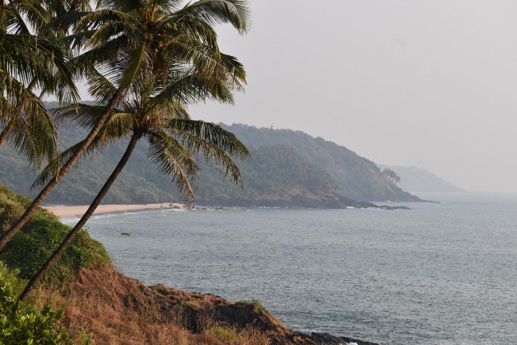 Saguntara Beach Homestay - Salle Familiale Avec Vue Sur La Mer