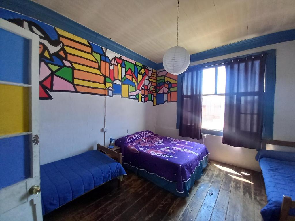 Postel nebo postele na pokoji v ubytování Casaclub Hostel