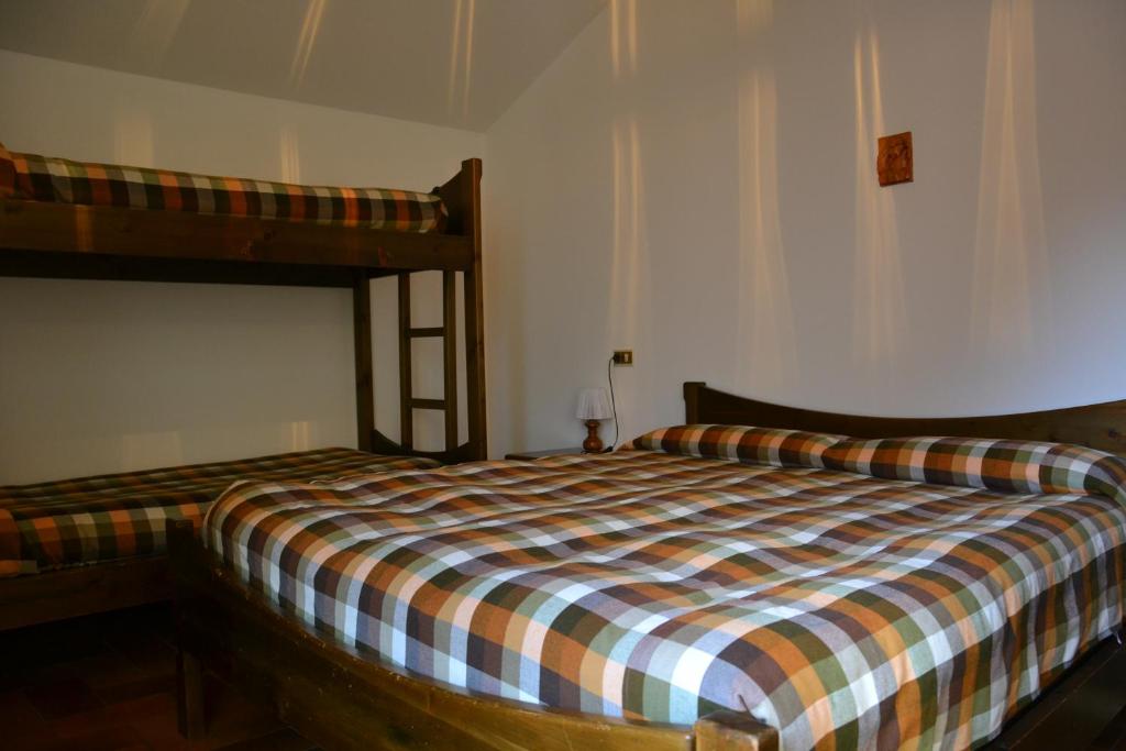 Postel nebo postele na pokoji v ubytování ALBERGO VALLUNGA