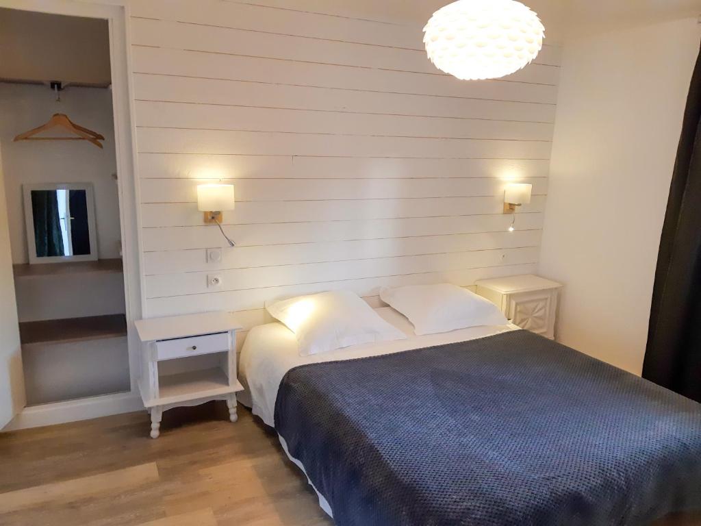 Postel nebo postele na pokoji v ubytování Gite Pavillon Le 1900