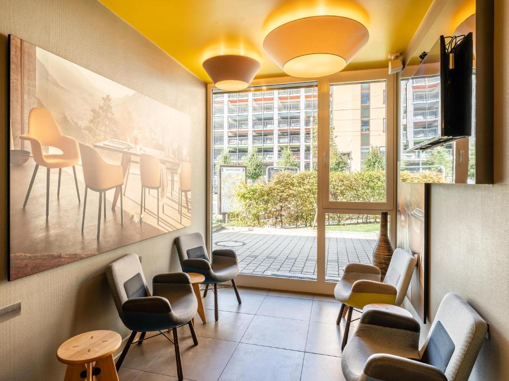 Posezení v ubytování B&B Hotel Weil am Rhein/Basel