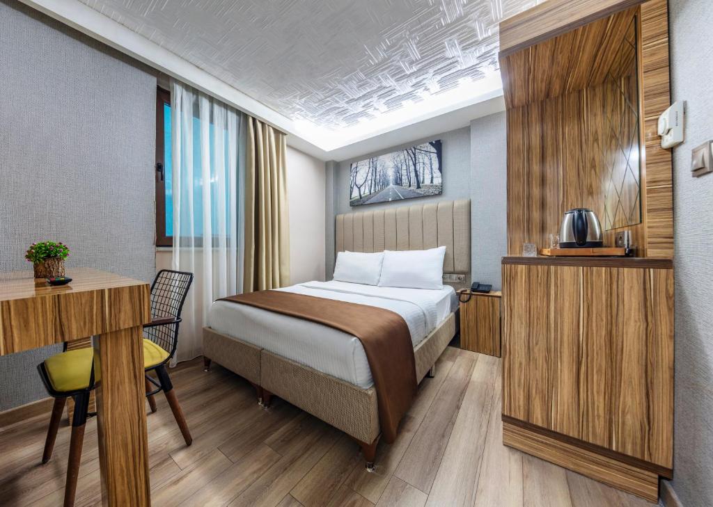 Postel nebo postele na pokoji v ubytování Dem İstanbul Airport Hotel