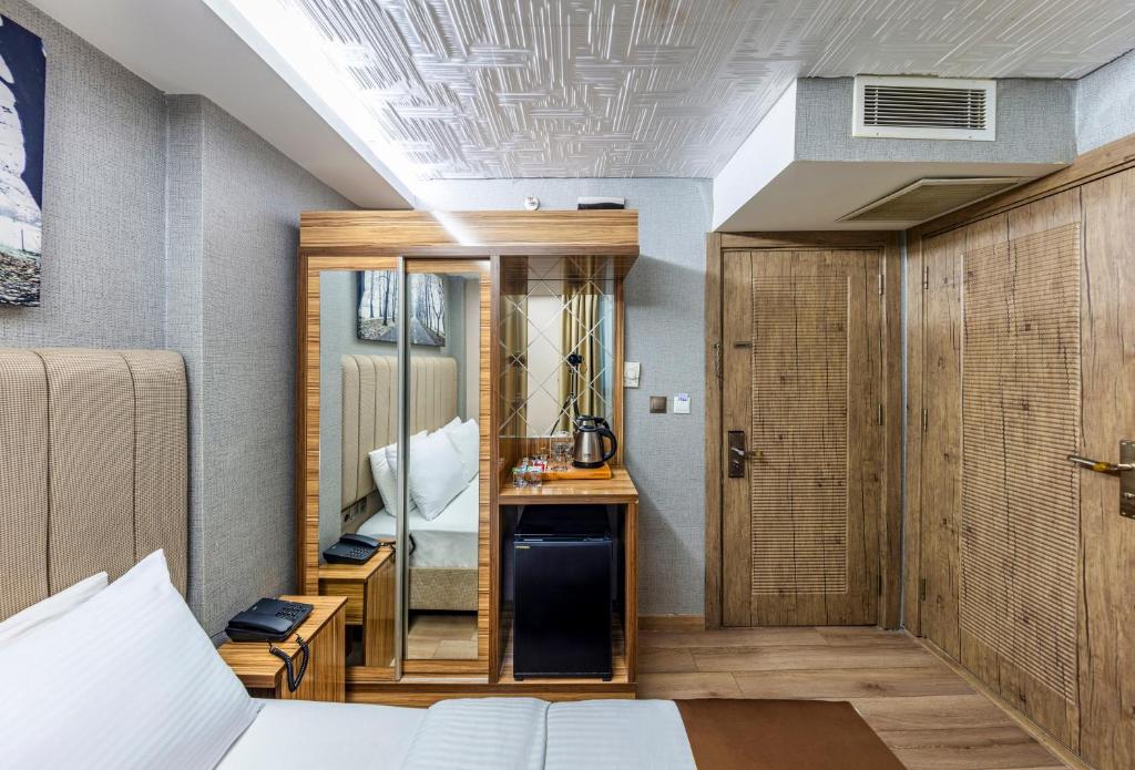 Postel nebo postele na pokoji v ubytování Dem İstanbul Airport Hotel