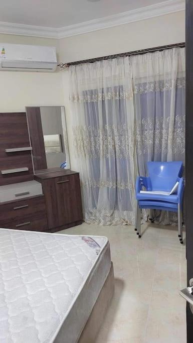 Postel nebo postele na pokoji v ubytování La Quinta Resort Hurghada
