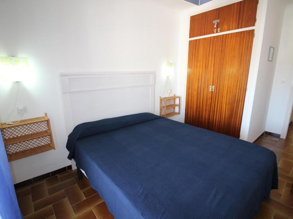 Posteľ alebo postele v izbe v ubytovaní MORÉ I 1 DRTA - Apartamento con vistas al mar, barrio tranquilo con jardín. - ES-228-54