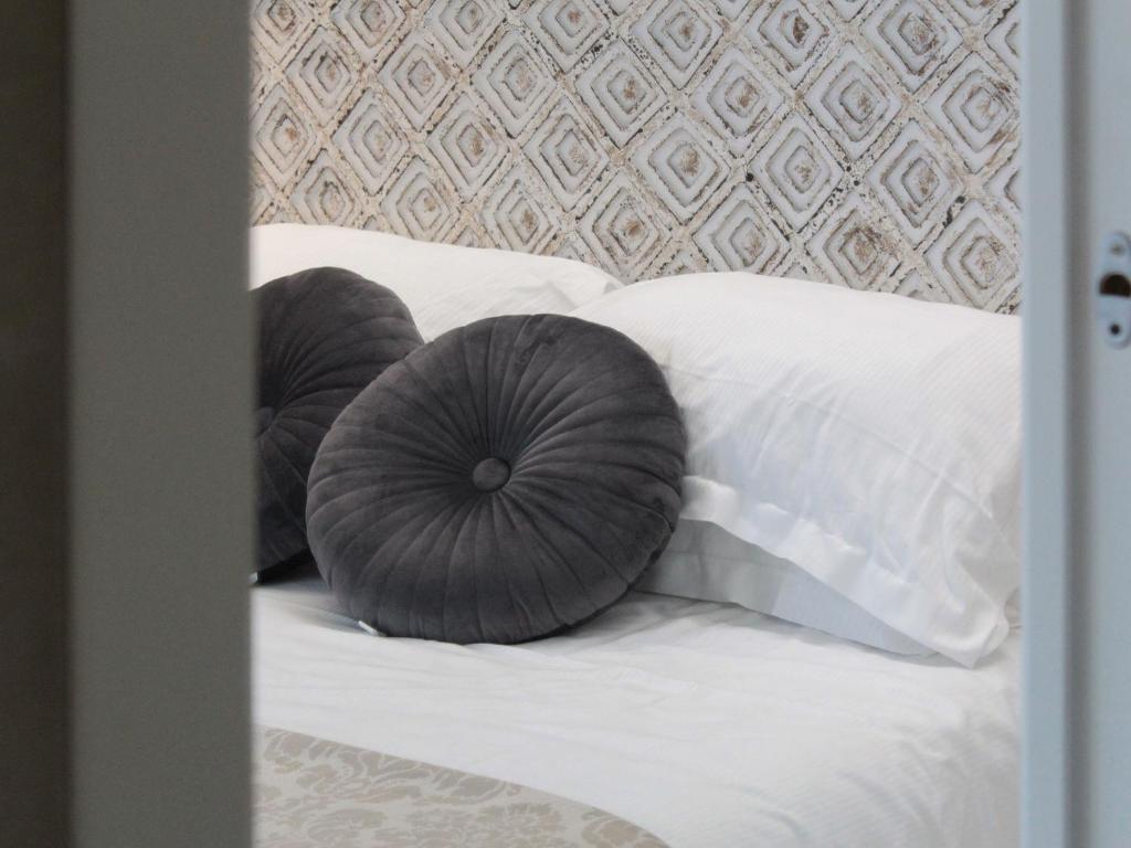 Postel nebo postele na pokoji v ubytování Casa Allegri