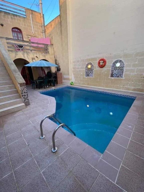 Bazén v ubytování Farmhouse with Pool, Tas-Summiena Gozo nebo v jeho okolí