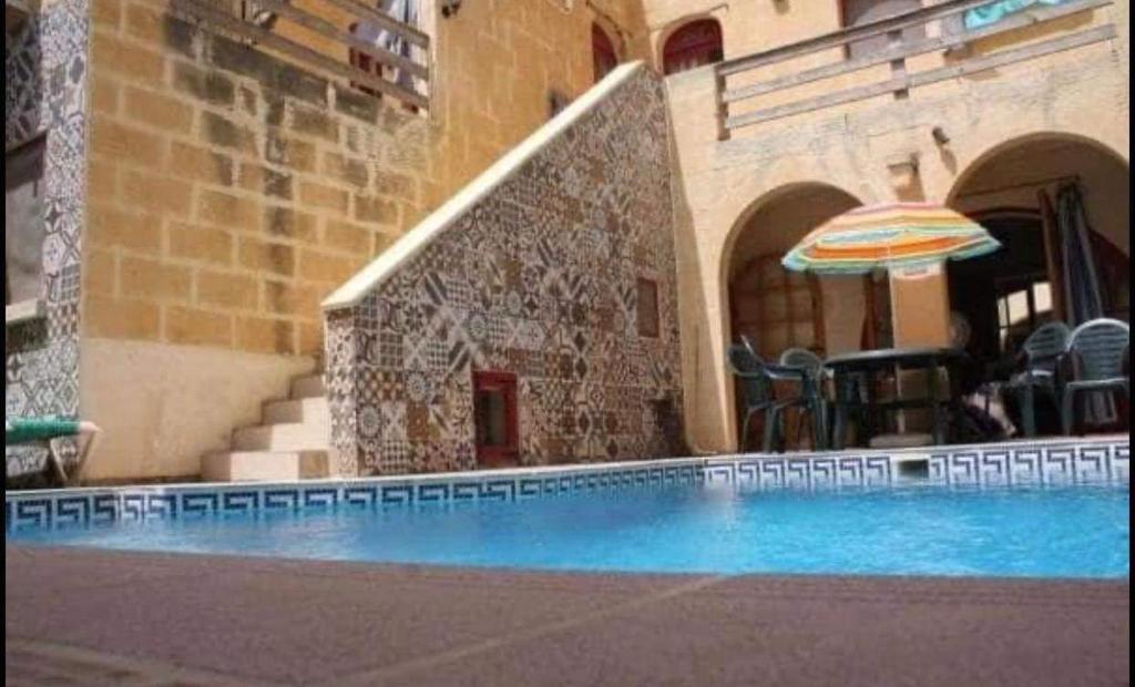 Bazén v ubytování Farmhouse with Pool, Tas-Summiena Gozo nebo v jeho okolí