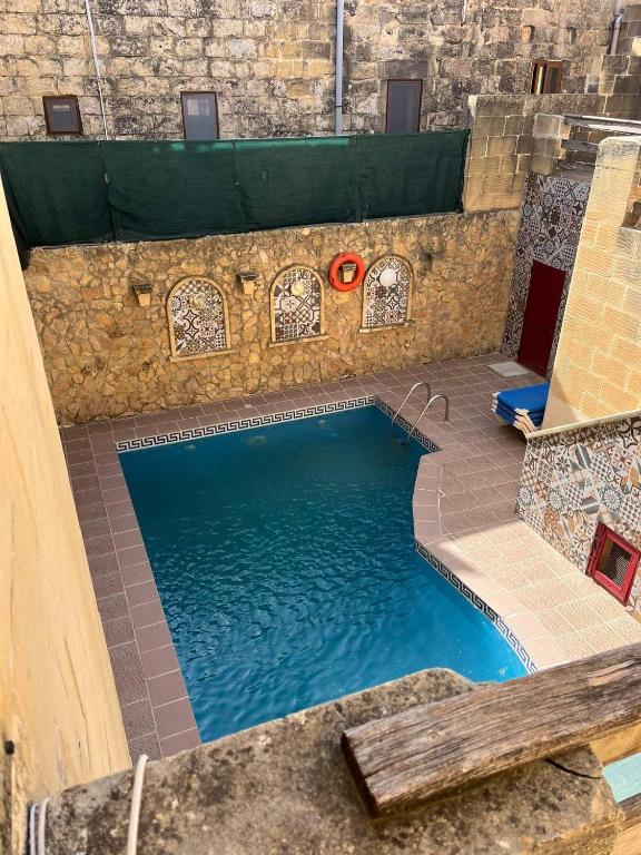 Bazén v ubytování Farmhouse with Pool, Tas-Summiena Gozo nebo v jeho okolí