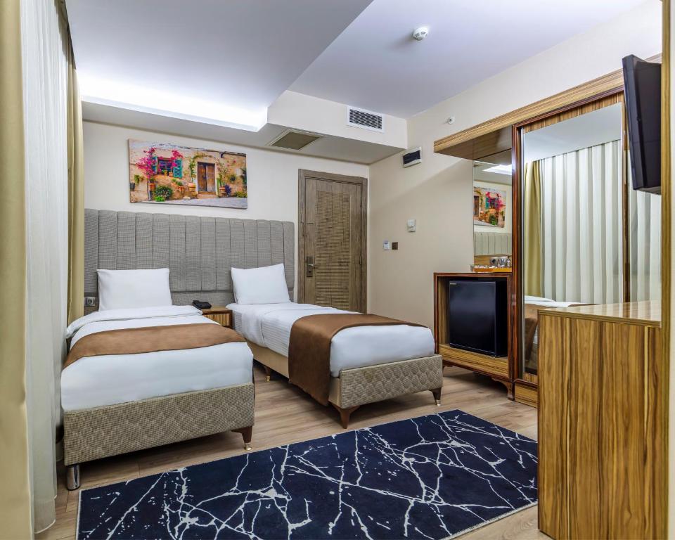 Postel nebo postele na pokoji v ubytování Dem İstanbul Airport Hotel