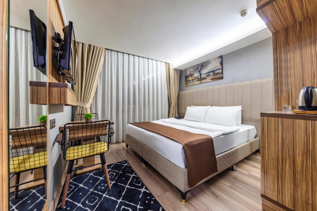 Postel nebo postele na pokoji v ubytování Dem İstanbul Airport Hotel