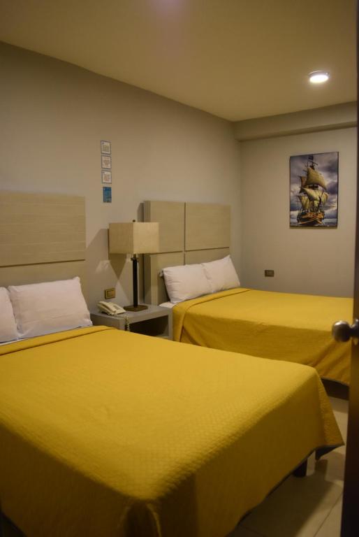 Postel nebo postele na pokoji v ubytování Hotel Boutique Boca - Veracruz
