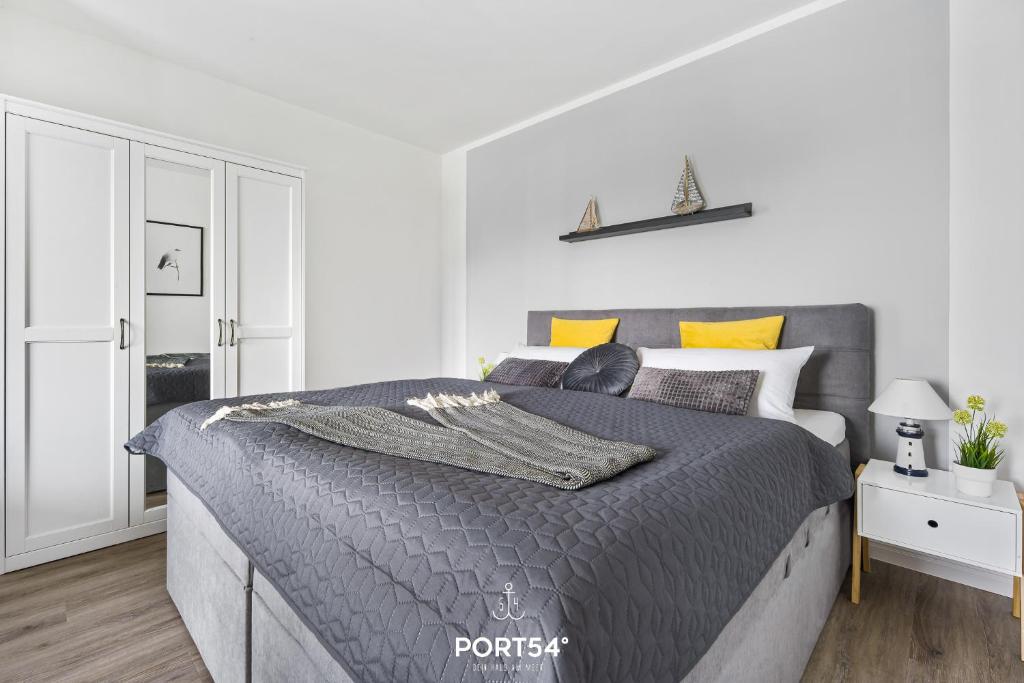 Postel nebo postele na pokoji v ubytování Meerzeit Damp