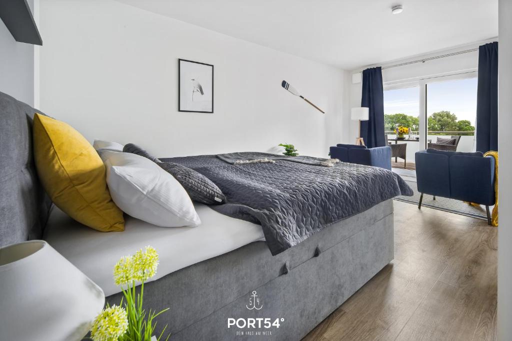 Postel nebo postele na pokoji v ubytování Meerzeit Damp