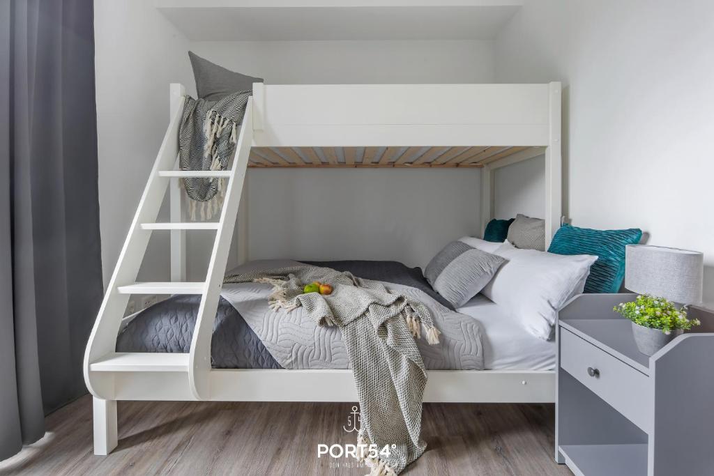 Postel nebo postele na pokoji v ubytování Ostseeoase Damp