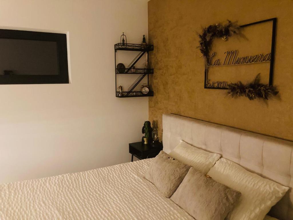 Postel nebo postele na pokoji v ubytování B&B La Miniera