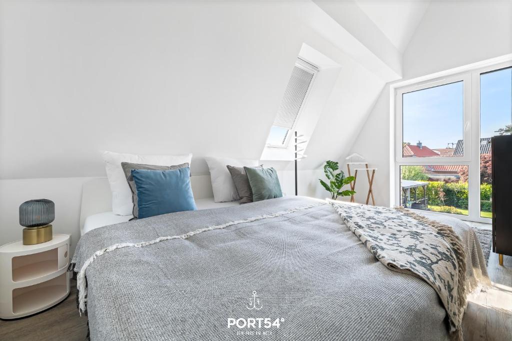 Postel nebo postele na pokoji v ubytování Buhne 16 Dänschendorf auf Fehmarn