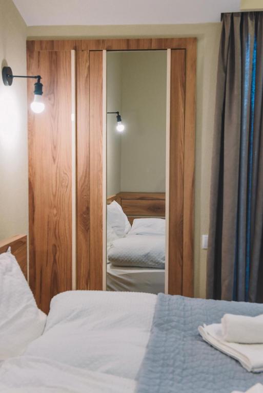 Кровать или кровати в номере MaRKoS flat in Bakuriani Inn