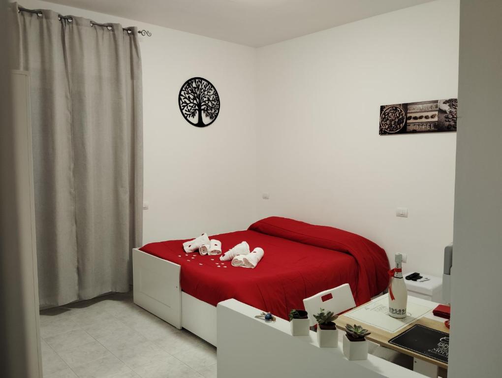 מיטה או מיטות בחדר ב-Casetta