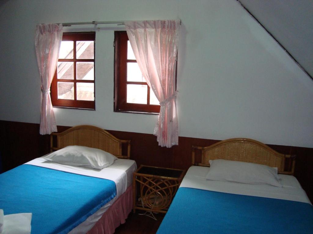 Postel nebo postele na pokoji v ubytování A&B Hotel