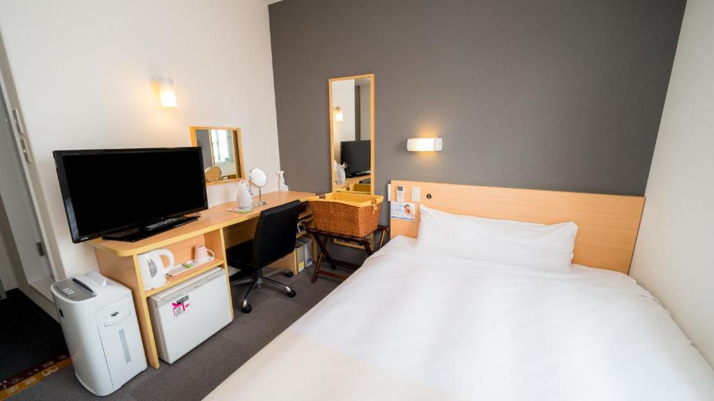 TV a/nebo společenská místnost v ubytování Super Hotel Yonago Ekimae