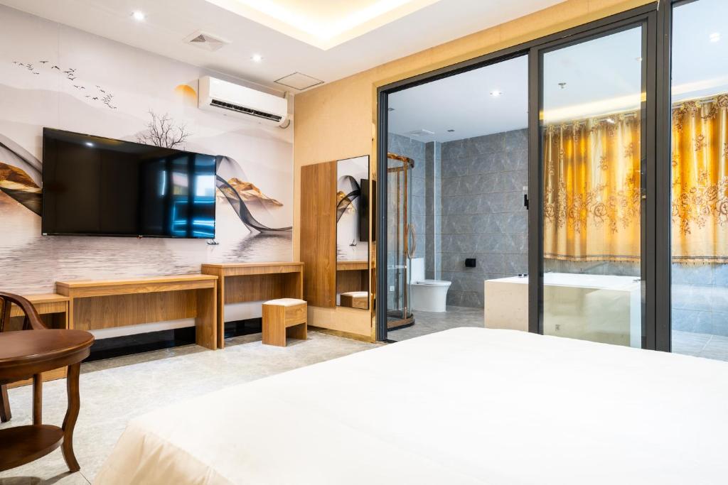 Postel nebo postele na pokoji v ubytování Home me Hotel