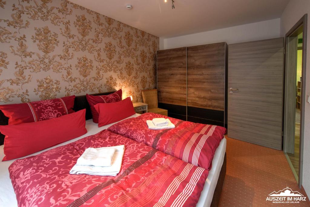 Postel nebo postele na pokoji v ubytování Auszeit-im-Harz Haus 6 Wohnung 3