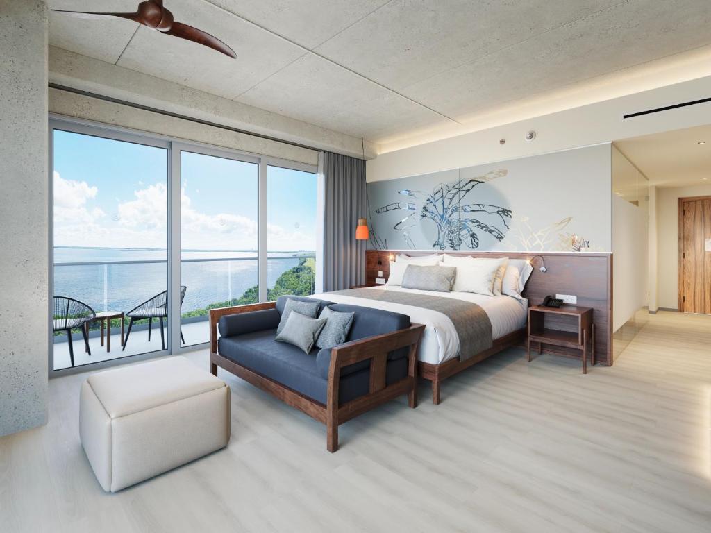 Postel nebo postele na pokoji v ubytování Hyatt Vivid Grand Island Cancun-All Inclusive Adults Only