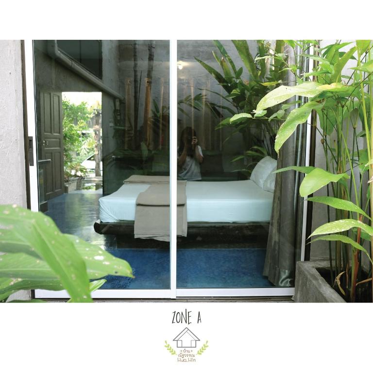 Postel nebo postele na pokoji v ubytování บ้านณัฐวรรณ หัวหิน - Baan Nattawan Huahin